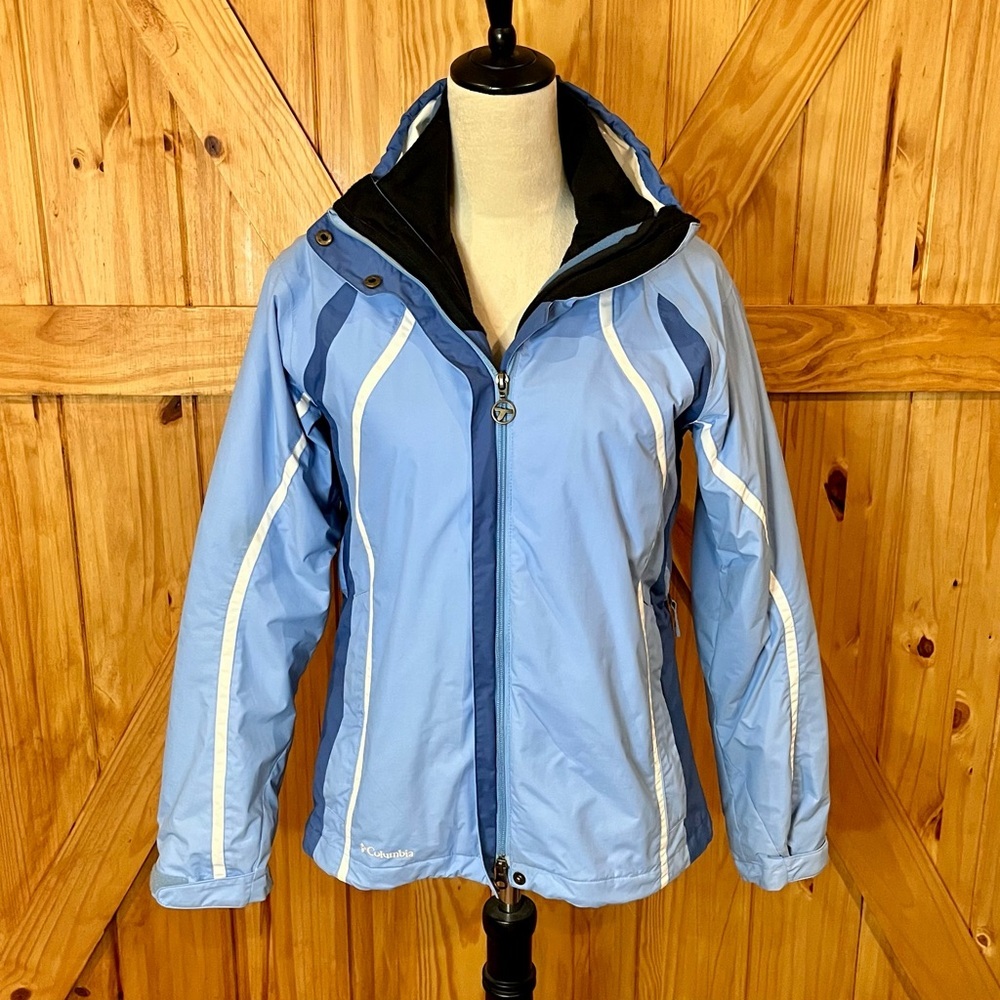 Columbia Blue Ladies Ski Jacket with High Collar and Water-Resistant Fabric